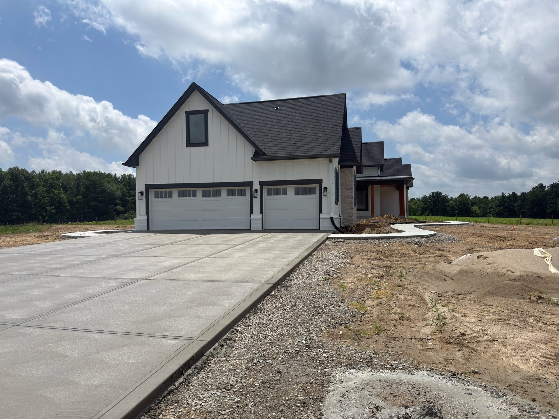 Concrete driveway with curved walkway